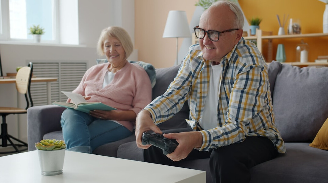 elderly man reading book